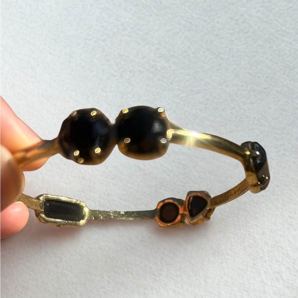 Kate Spade -Gold Tone Metal Bangle Bracelet with Black Stones, Slip On Style - Picture 2 of 4